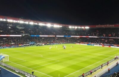 Floodlit Parc des Princes stadium in Paris during a Paris Saint-Germain match